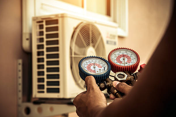 Professional Heat Pump Repair technician working in Magnolia, KY